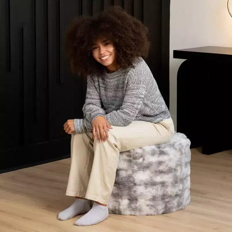 Pouf rond en fausse fourrure