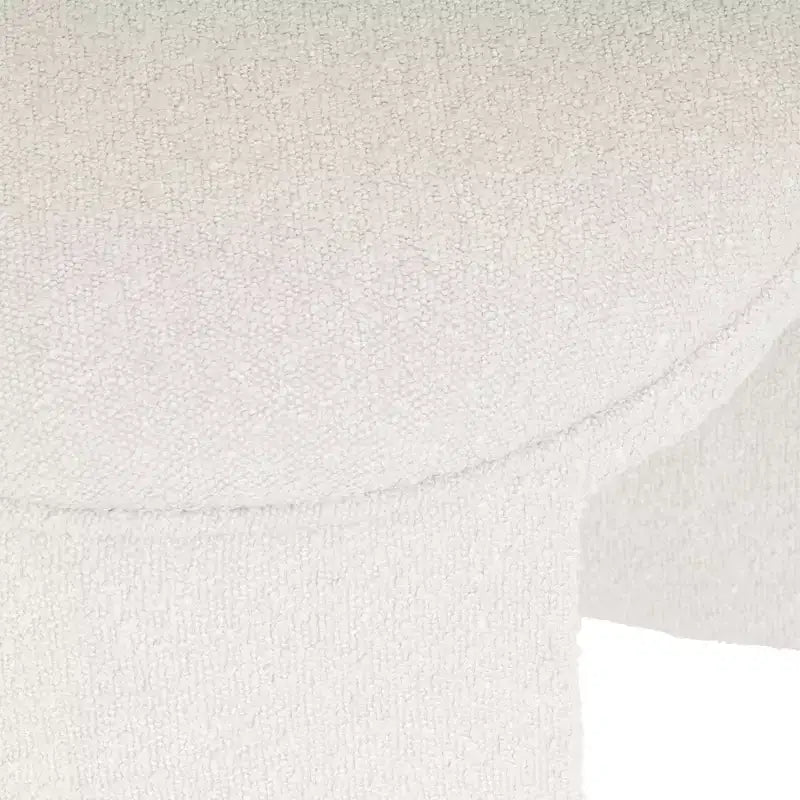 Pouf en tissu bouclé crème