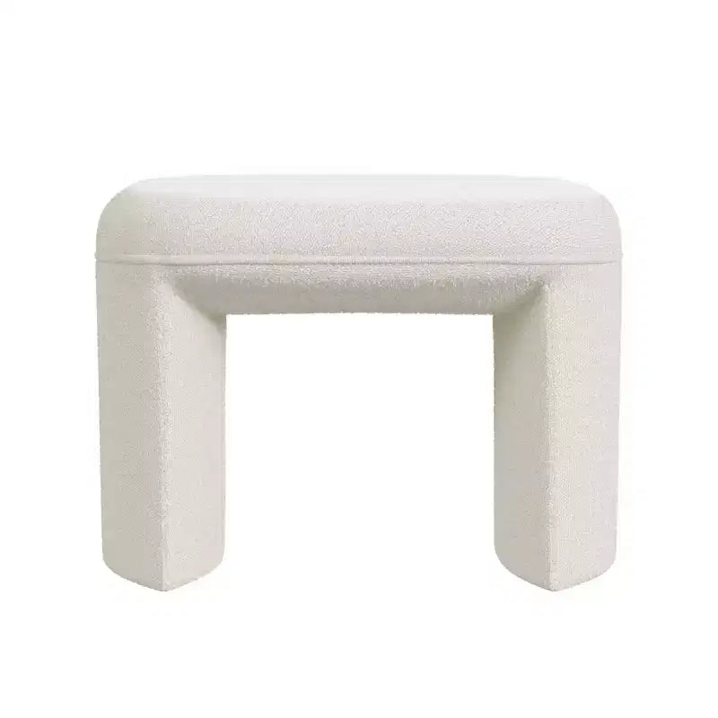 Pouf en tissu bouclé crème